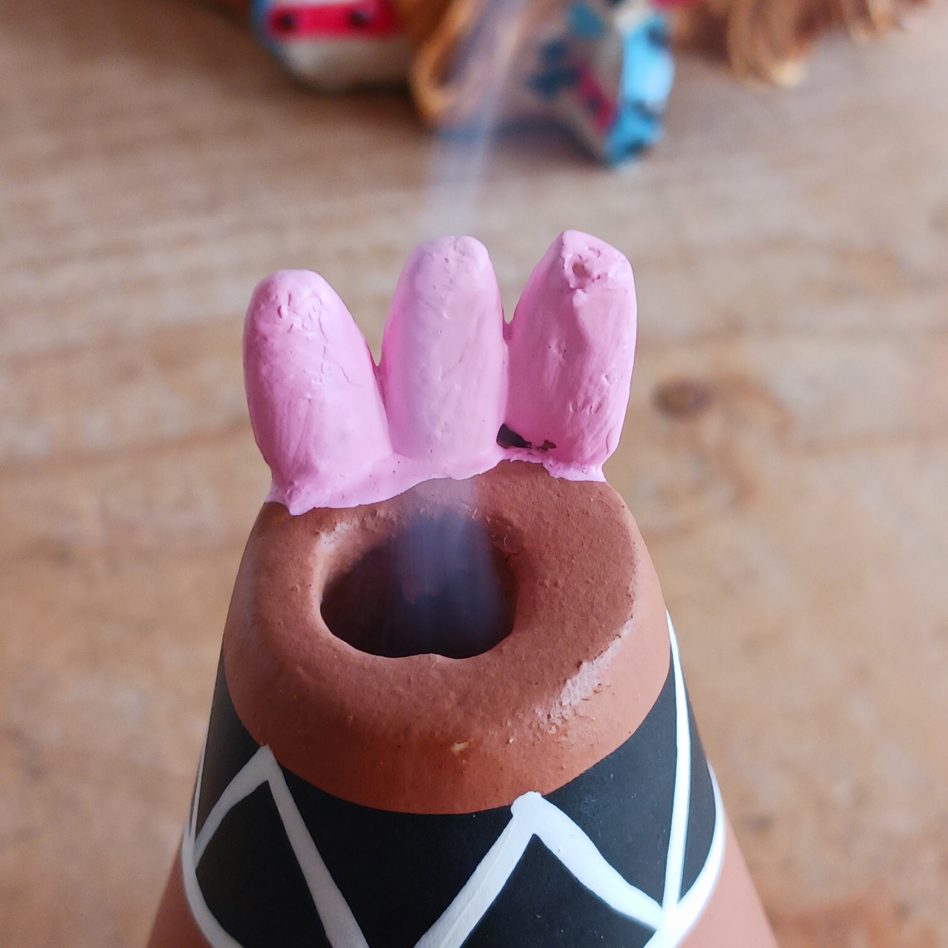 Elevate your incense game with our Clay Tipi Incense Holder.&nbsp;This unique piece has been lovingly handmade and is fairtrade, bringing a touch of charm and authenticity to your home.&nbsp; This quirky tipi design not only catches ash neatly but also adds a playful, earthy vibe to any space. Perfect for meditation, relaxation, or simply creating good vibes and maybe a few smoke signals!