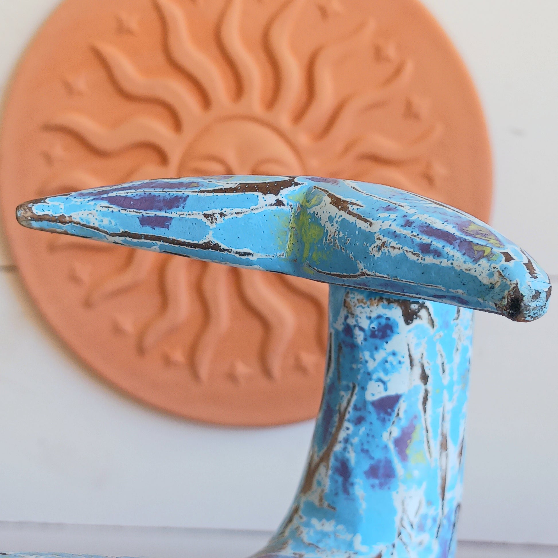 Bring the beauty of the coast into your home with this charming Colourful Wooden Whale. Handcrafted with a rustic finish and vibrant colours, this decorative wooden whale captures the relaxed spirit of seaside living. Whether displayed in a living room, bathroom, hallway, beach house, or coastal-themed space, it adds warmth, character, and nautical charm to your décor.