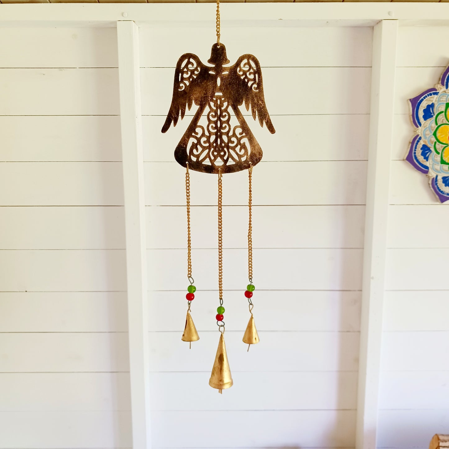 Create a peaceful and uplifting atmosphere with this beautifully crafted Angel Indian Chime with Brass Bells. Featuring an intricately detailed angel figure symbolizing protection, guidance, and serenity, this decorative hanging chime is designed to bring a sense of calm and spiritual harmony to any home, garden, meditation space, or sacred area.