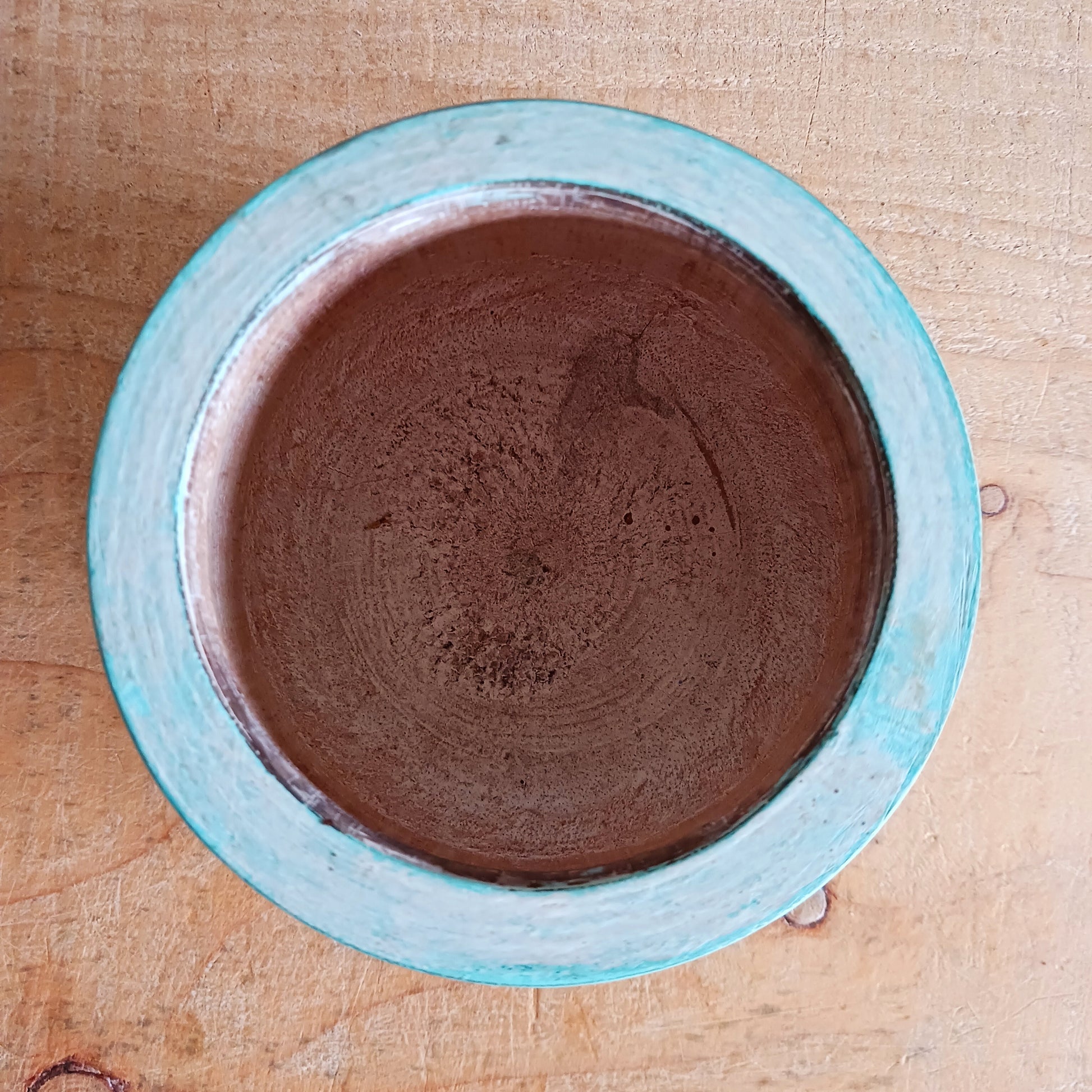 Bring authentic Balinese craftsmanship into your home with this turquoise hand-carved tribal wooden pot. Perfect for storing trinkets, small treasures, or displaying your favourite plants, this versatile pot adds a touch of boho charm to any space.