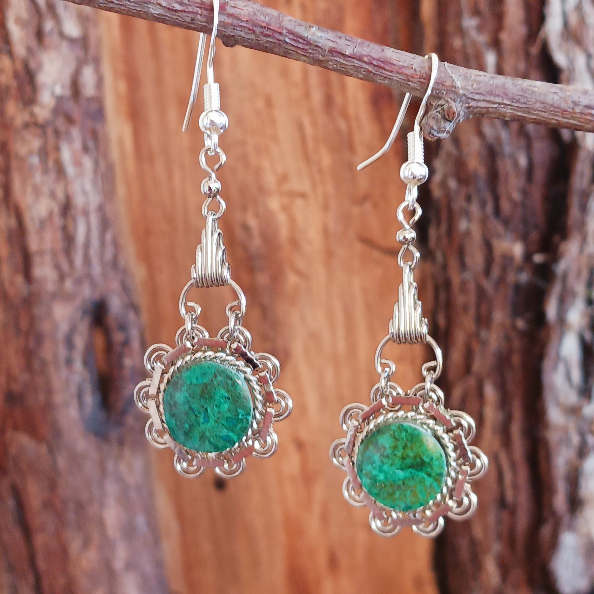 Add a touch of bohemian beauty to your look with these handmade Peruvian stone earrings. Featuring green turquoise stones and finished with silver-plated hooks, each pair is carefully crafted in small workshops in Peru.