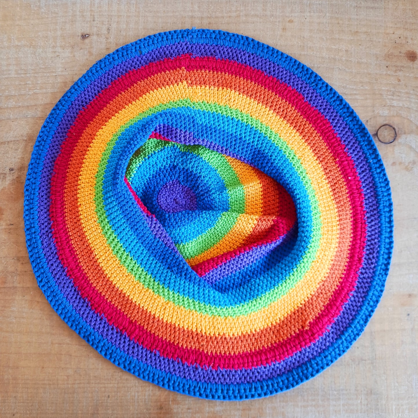 Add a splash of colour to your summer wardrobe with this beautiful Handmade Rainbow Crochet Cotton Sun Hat. Carefully handcrafted, this vibrant hat is designed to keep you comfortable while making a bold statement wherever your adventures take you.