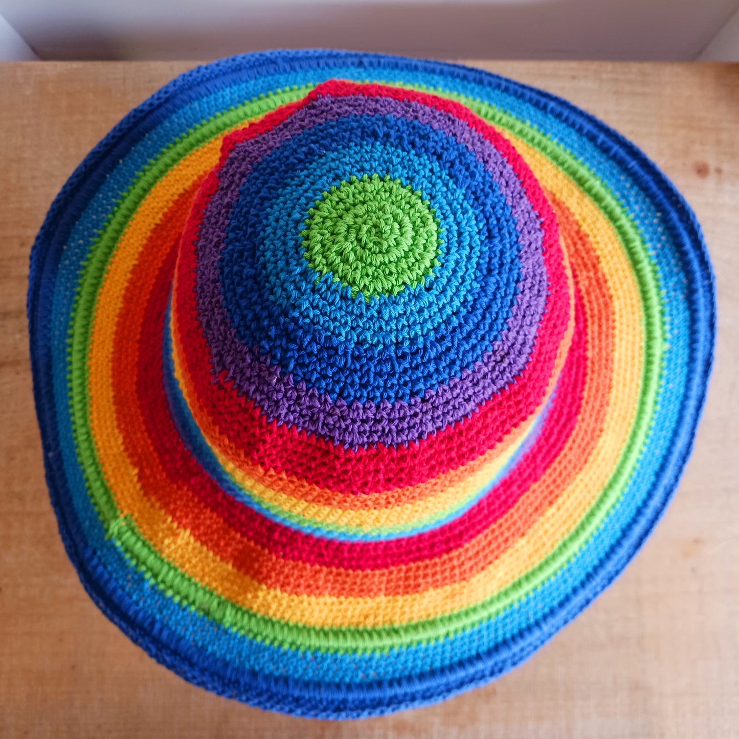 Brighten up your summer with this vibrant handmade crochet cotton sun hat! Featuring a stunning rainbow pattern, this unique hat is perfect for holidays, beach days, and festivals.