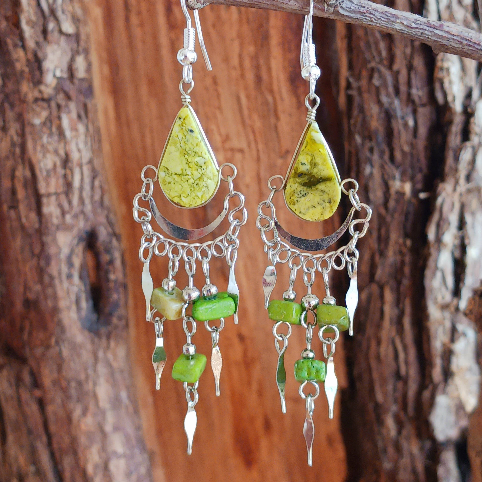 Add a touch of bohemian beauty to your look with these handmade Peruvian stone earrings. Featuring green aventurine stones and finished with silver-plated hooks, each pair is carefully crafted in small workshops in Peru.