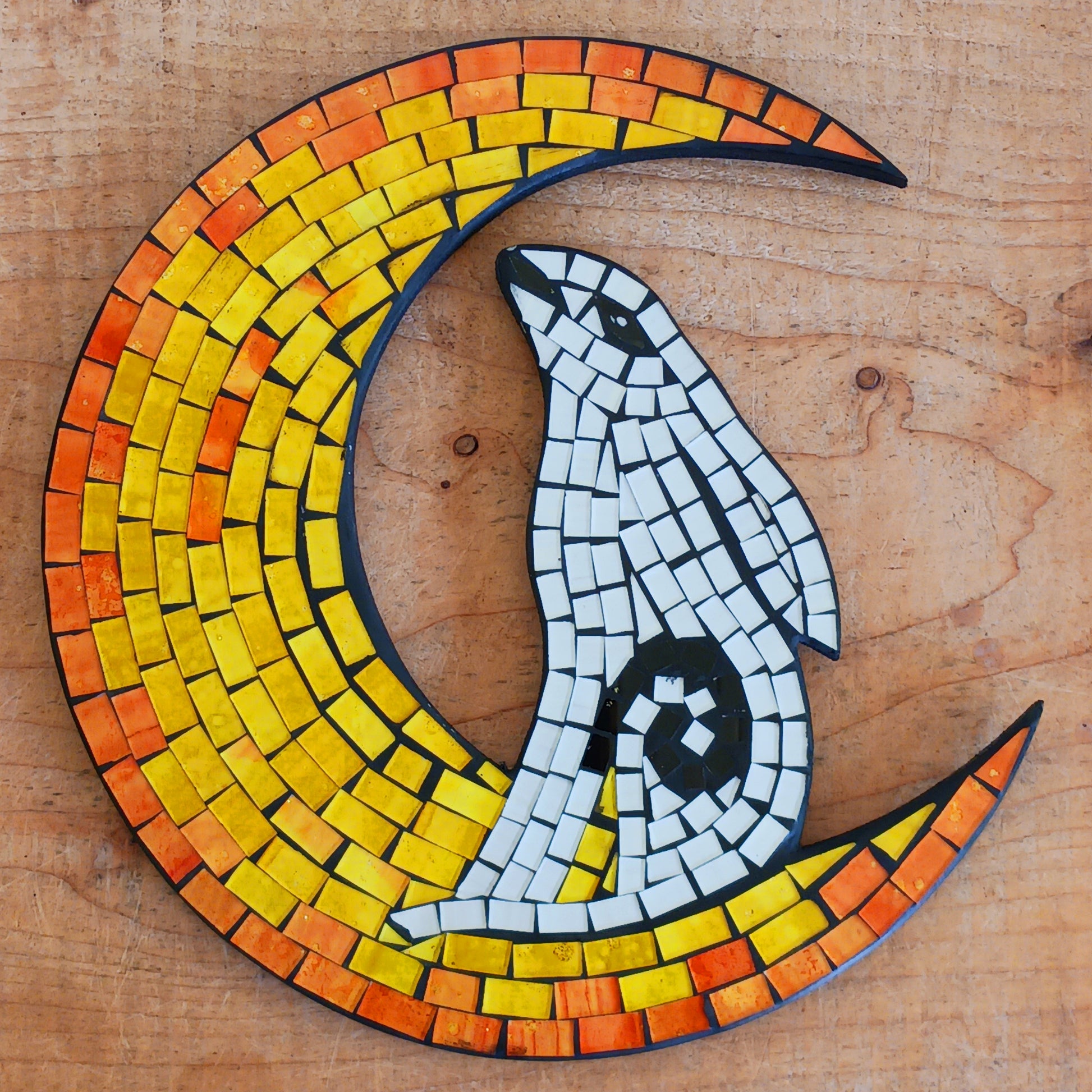 Add a touch of whimsy to your home décor with this enchanting handcrafted wall hanging. Featuring a vibrant yellow mosaic crescent moon and a serene white hare, this unique plaque is a striking statement piece for any room. Perfect for bohemian, mystical, or nature-inspired interiors, it makes a thoughtful gift or a distinctive addition to your own collection.