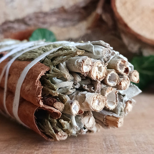 This smudge stick features a combination of three sacred herbs, White Sage, Cedar and Cinnamon.