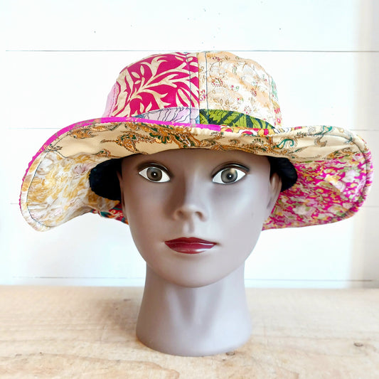 A swell little number for festivals and summer times, you'll look the coolest in this recycled sari patchwork sun hat. Black polyester lined, with a slightly flexible brim for adjusting the shape.