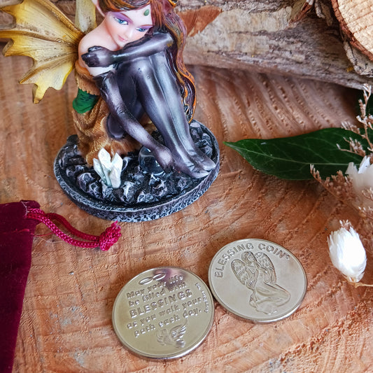 This Blessing Angel coin, whether given or received, conveys its angel blessing on you.  The front of the coin shows a kneeling angel with the inscription Blessing Coin. The reverse depicts a dove and the message "May your life be filled with Blessings as you walk your path each day".