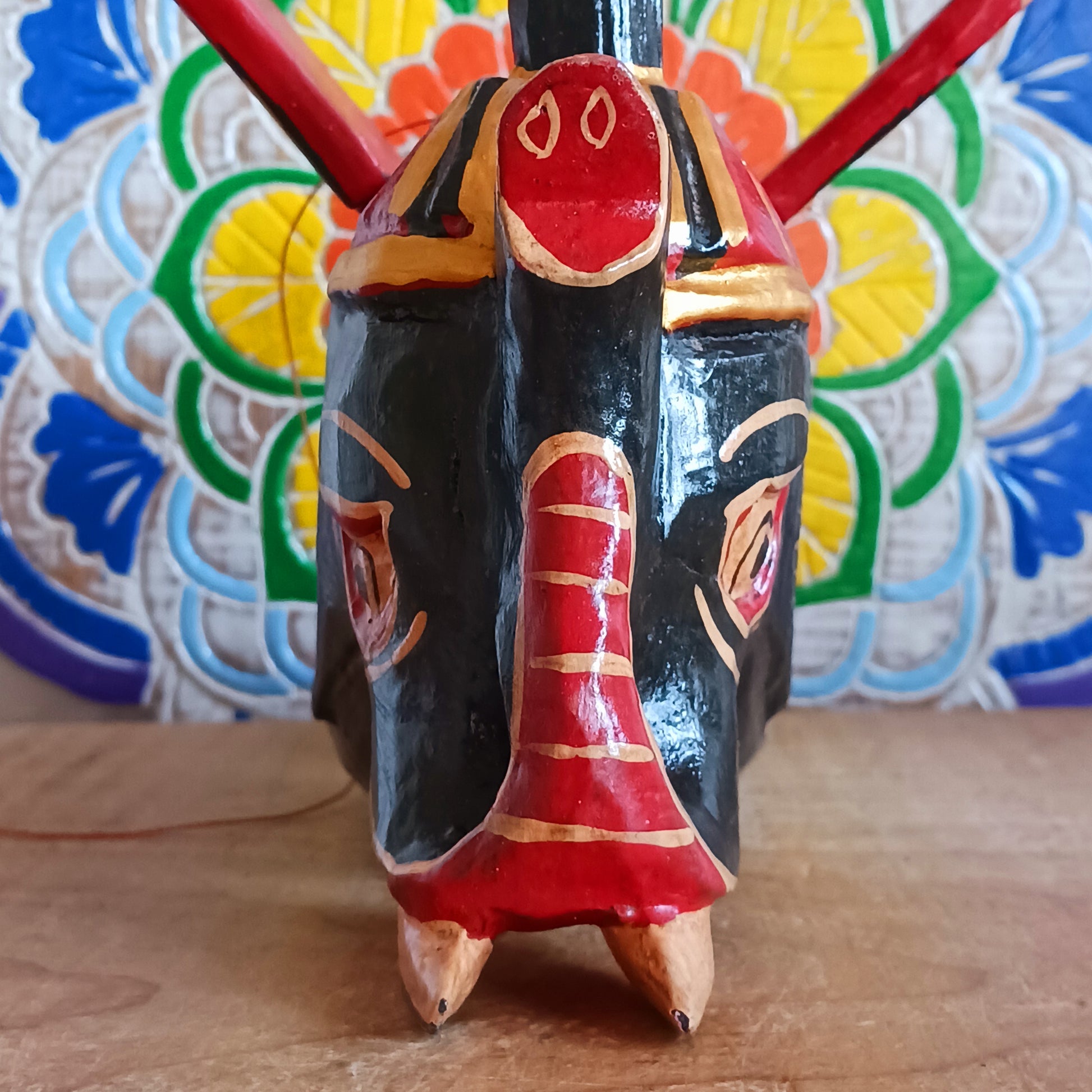 Bring a touch of wonder to your space with this enchanting Flying Elephant Mobile. Each piece is hand-carved from lightweight wood and finished with unique hand-painted patterns, giving every elephant its own personality. Delicately balanced wings hover gracefully with the slightest breeze, creating a calming sense of motion and magic.