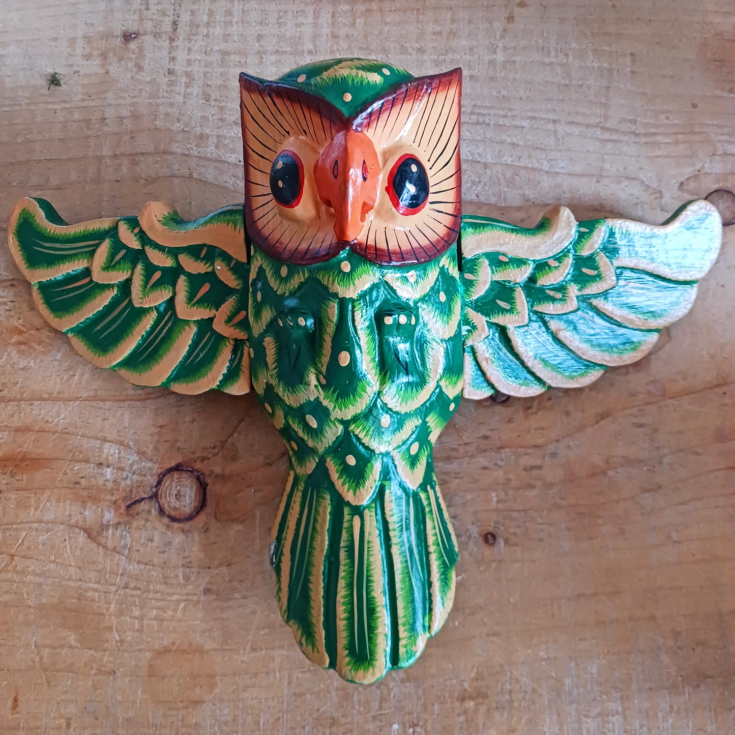 Bring a sense of peace and wonder to your space with this Hand-Carved Wooden Flying Owl Mobile. Each piece is lovingly crafted from natural wood, featuring a beautifully detailed owl with outstretched wings in graceful flight. Suspended from a delicate string, the owl moves gently with the breeze, creating a calming, soothing motion.
