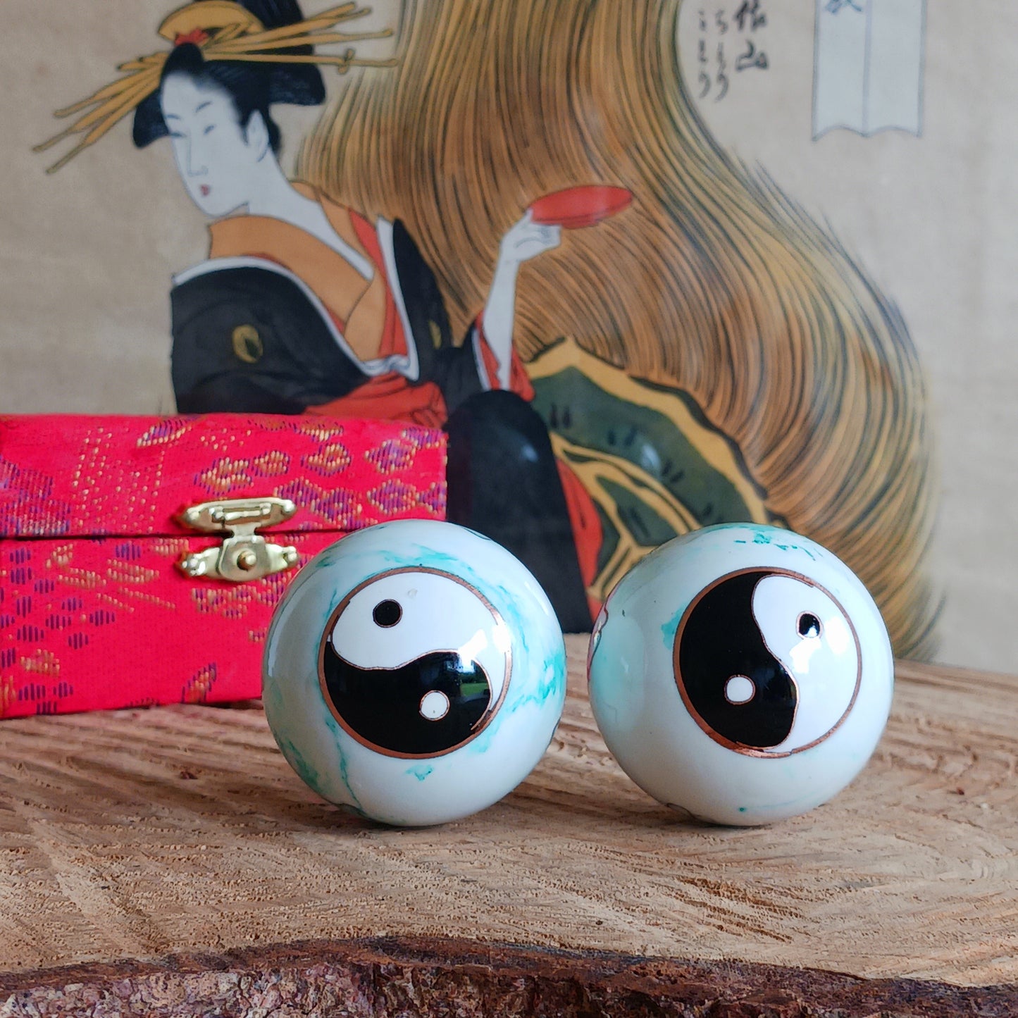 Enhance relaxation, hand strength, and mindfulness with these Yin Yang White &amp; Green Marbled 4 cm Baoding Health Balls. Traditionally used in Chinese wellness practices, these beautifully finished chrome-plated steel balls are designed to gently rotate in your hands, helping stimulate pressure points, improve finger flexibility, and encourage relaxation.