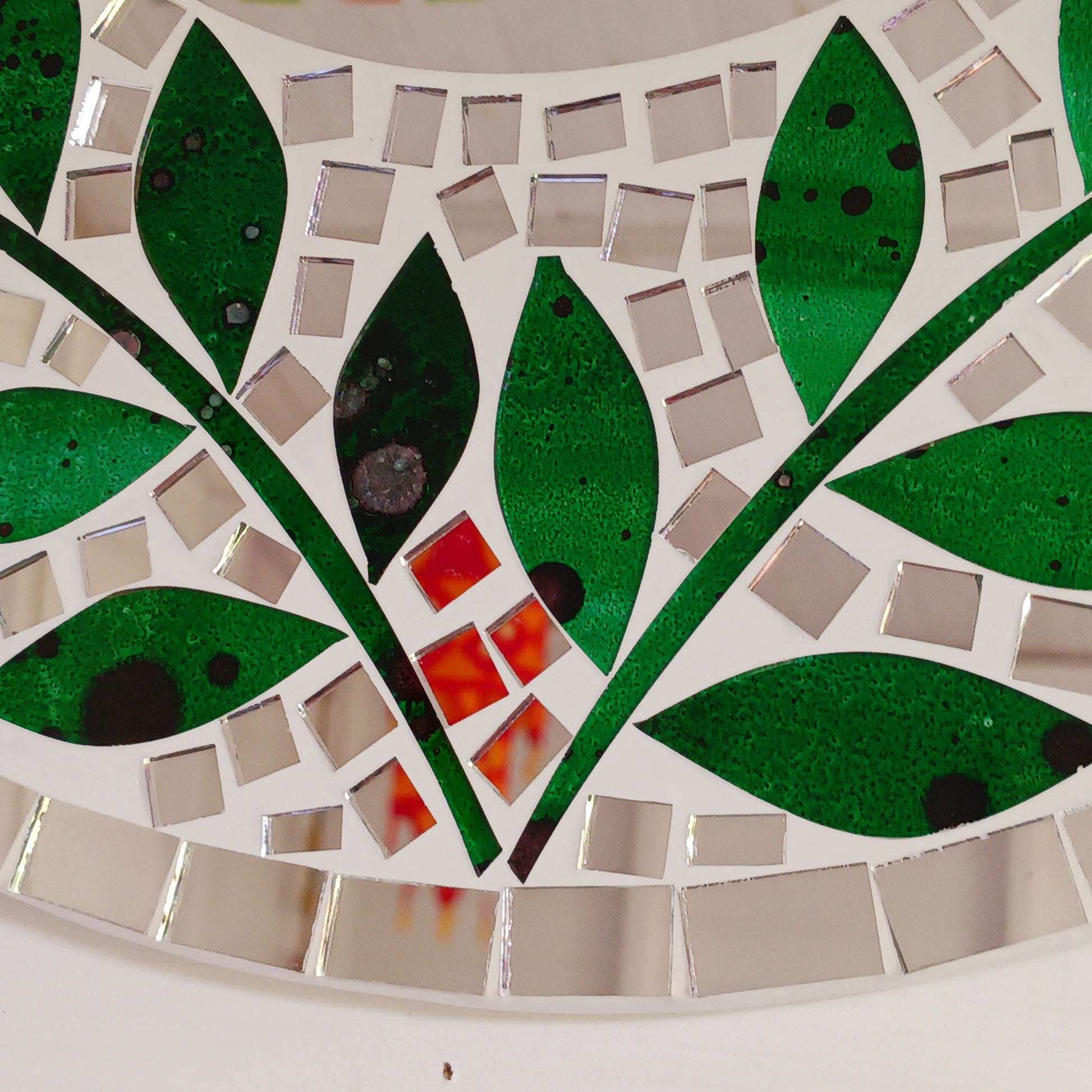 Transform any room into a vibrant oasis with our large Handmade Mosaic Floral Mirror. Crafted with care, this stunning mirror features a bright floral mosaic design that instantly adds style and colour to your décor. Perfect as a statement piece for living rooms, bedrooms, hallways, or entryways, it reflects not only light but also personality. Each mirror is uniquely handmade, making it a one-of-a-kind addition to your home.