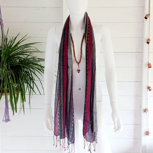 Immerse yourself in the alluring world of bohemian fashion with this delicate Indian Boho Scarf. Crafted with care, each scarf captures the essence of India's free-spirited charm, adding a touch of Boho elegance to your outfit. Whether draped effortlessly over your shoulders, wrapped as a headscarf, or styled with creative knots, this versatile accessory enhances your everyday fashion. Lightweight, breathable, and full of personality, it’s the perfect way to express your unique style.