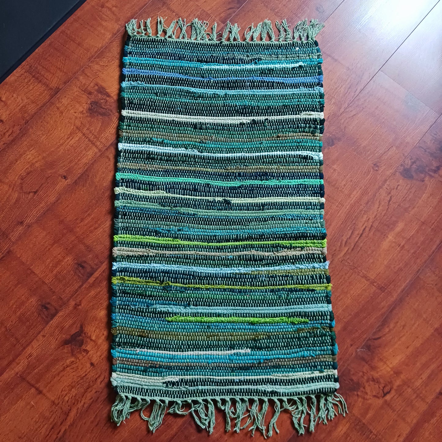 Enhance your living space with this premuim quality rag rug.  Whether used in kitchens, bathrooms, or even as a decorative accent in bedrooms and living rooms, the natural green tones will bring a sense of serenity and freshness to any environment.