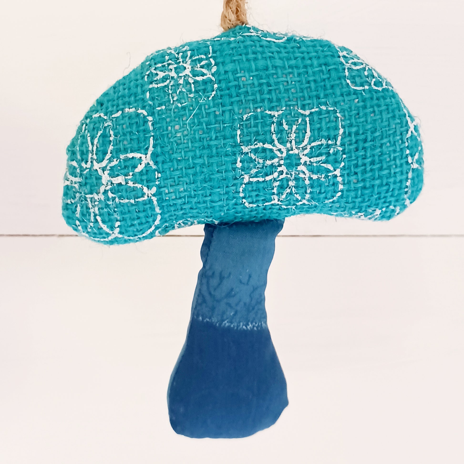 These decorative hanging toadstool garlands will brighten up your home and garden. Handmade in Bangladesh, each of these fun garlands are unique.