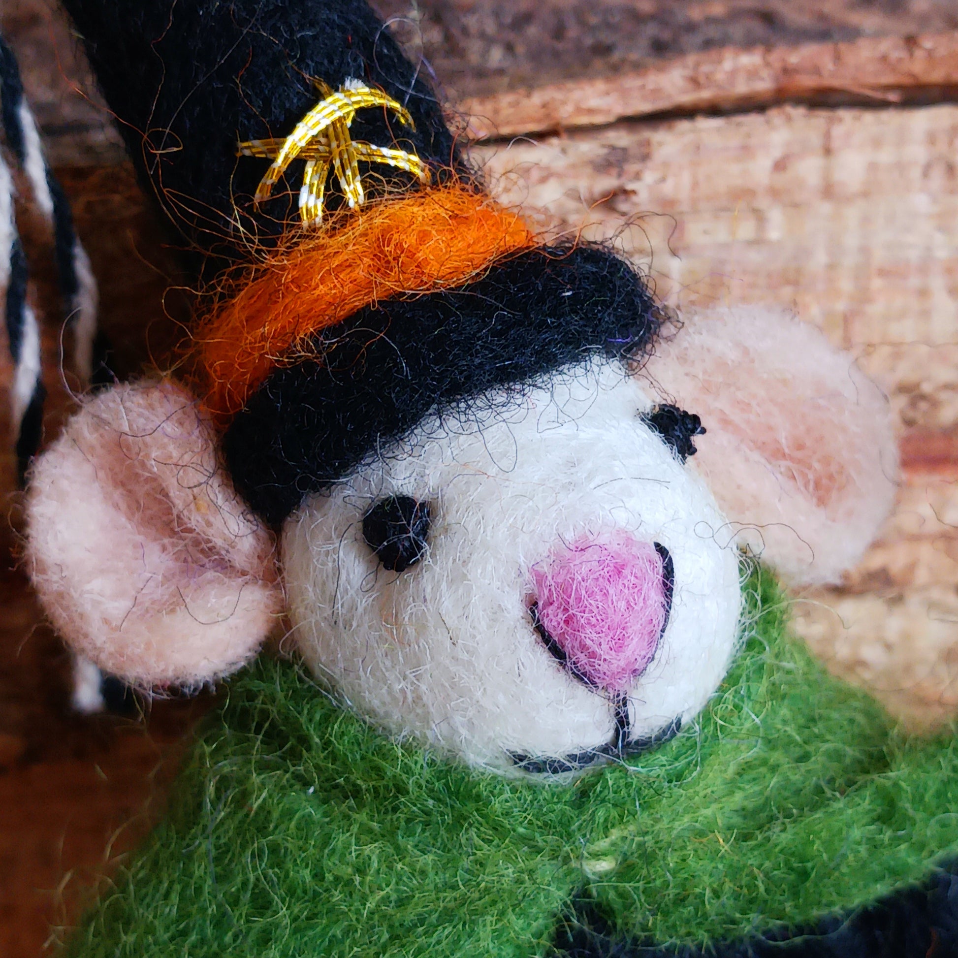 Bring a touch of handcrafted Halloween charm to your home with these delightful felted mice dressed as a Witch character. Each mouse features adorable details including long tails, soft pink ears and noses, and colourful pointed hats and capes. The Witch style is elegantly finished with gold star embroidery for extra magical flair, complete with little broomstick.
