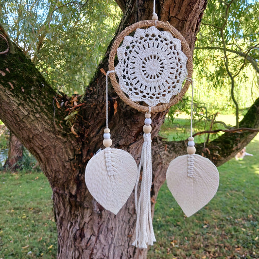 Bring peace, balance, and natural elegance into your home with this handmade Medium Natural Elemental Spirits Dream Catcher. Crafted with love and care on the spiritually blessed island of Bali, this vegan-friendly piece is made entirely from natural materials, free of feathers. Its earthy tones and organic textures create a warm and grounding presence, perfect for bedrooms, meditation spaces, or as a thoughtful gift.