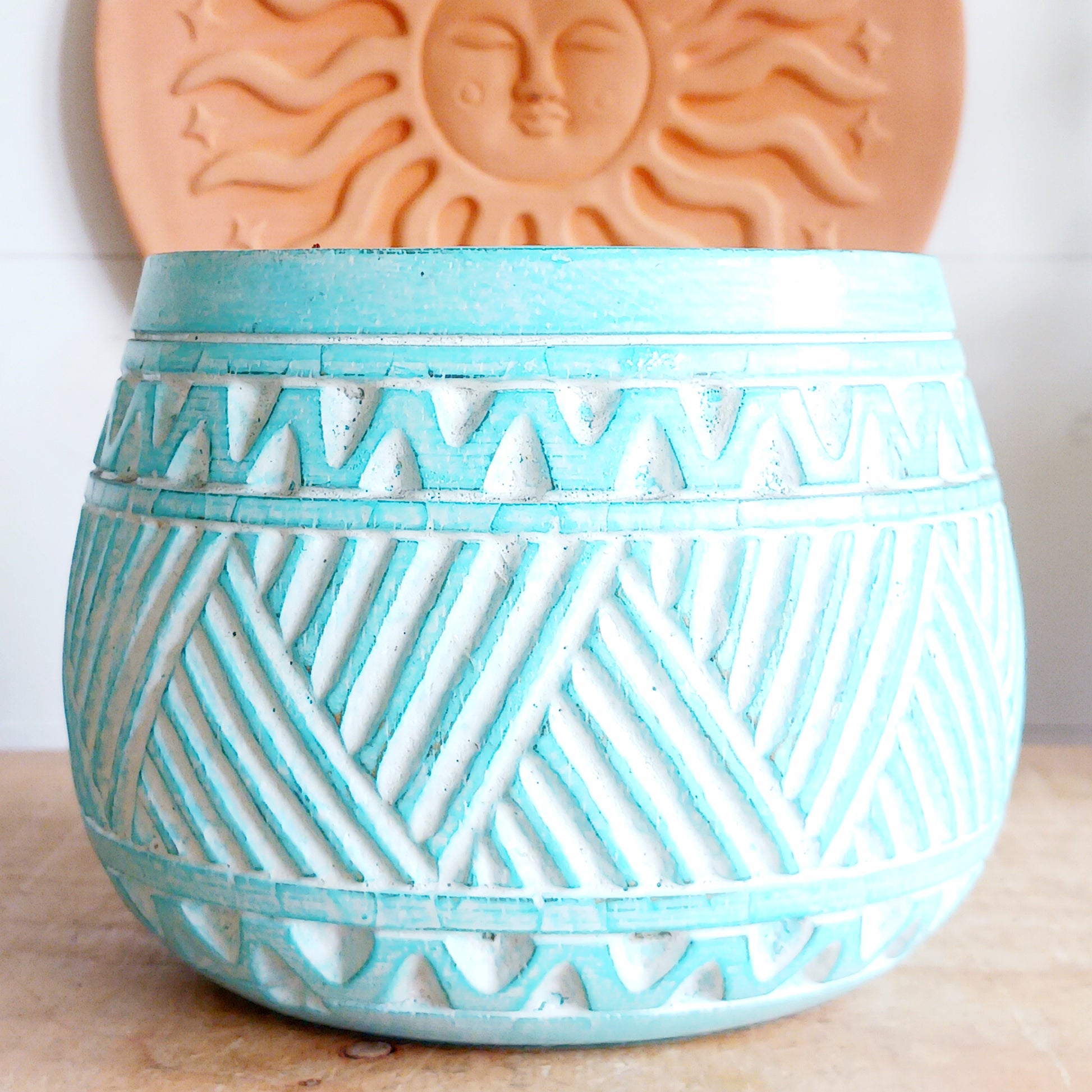 Bring authentic Balinese craftsmanship into your home with this turquoise hand-carved tribal wooden pot. Perfect for storing trinkets, small treasures, or displaying your favourite plants, this versatile pot adds a touch of boho charm to any space.