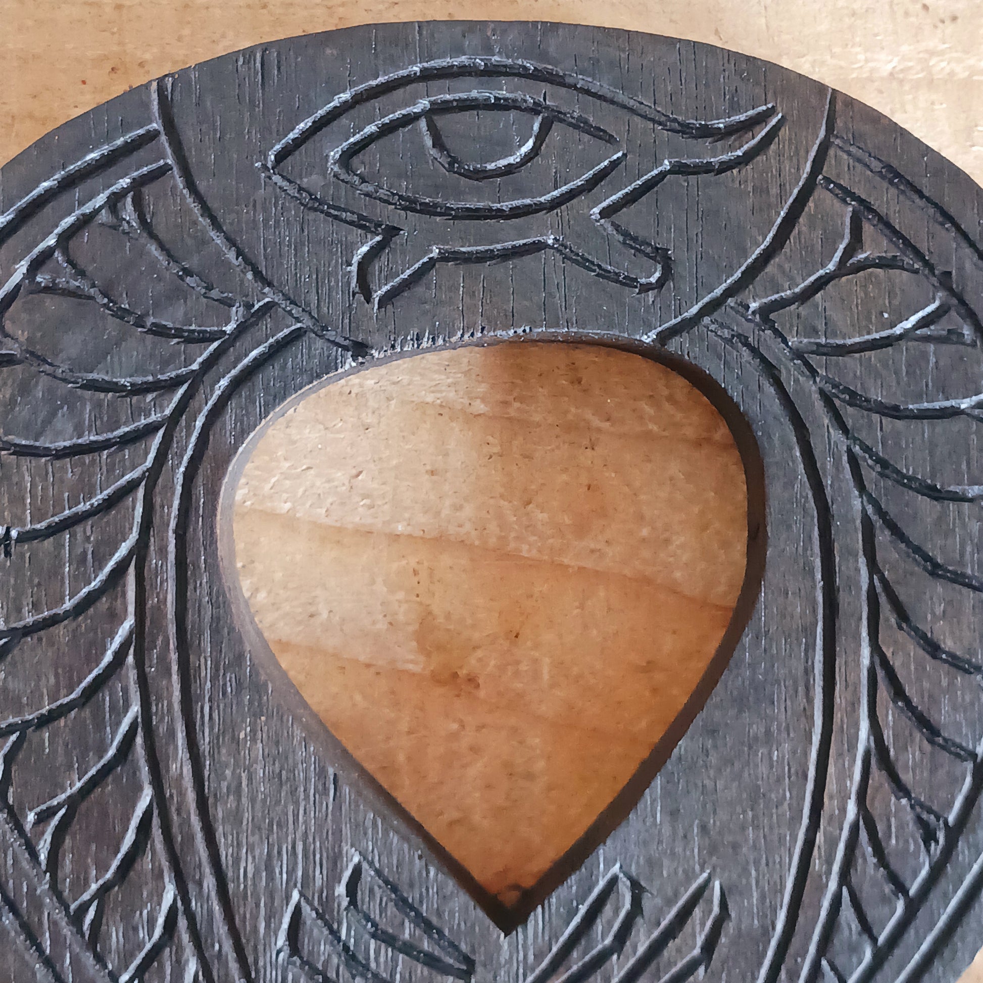 This beautiful and intricately carved wall plaque features a traditional symbol of the ancient Egyptians. The ankh is often interpreted as a symbol of life and eternal existence. Its looped top is thought to represent the eternal soul, while the straight line below symbolises the earthly plane or physical existence. Together, they signify the eternal cycle of life, death, and rebirth.