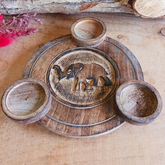 Add warmth, charm, and timeless style to your space with this beautifully hand carved wooden elephant tealight holder. Crafted from natural wood, each piece features unique grain patterns and rich brown tones, making every holder truly one of a kind.