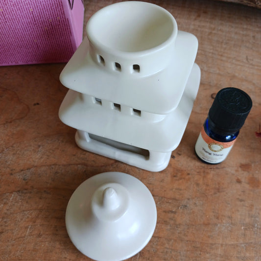 Bring a sense of tranquillity and elegance to your home with this Japanese Pagoda Oil Burner &amp; Wax Melt Warmer. Inspired by traditional Japanese architecture, this beautifully designed ceramic burner creates a calming atmosphere while filling your space with your favourite fragrances.