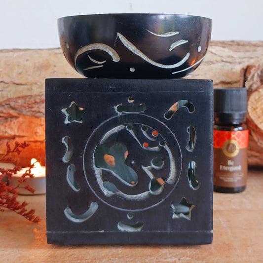 Create a peaceful and calming atmosphere in your home with this beautifully crafted Black Soapstone Om Essential Oil Burner. Hand-carved from polished natural soapstone, this elegant aromatherapy burner features intricate Om symbols on each side, representing harmony, balance, and spiritual awareness.