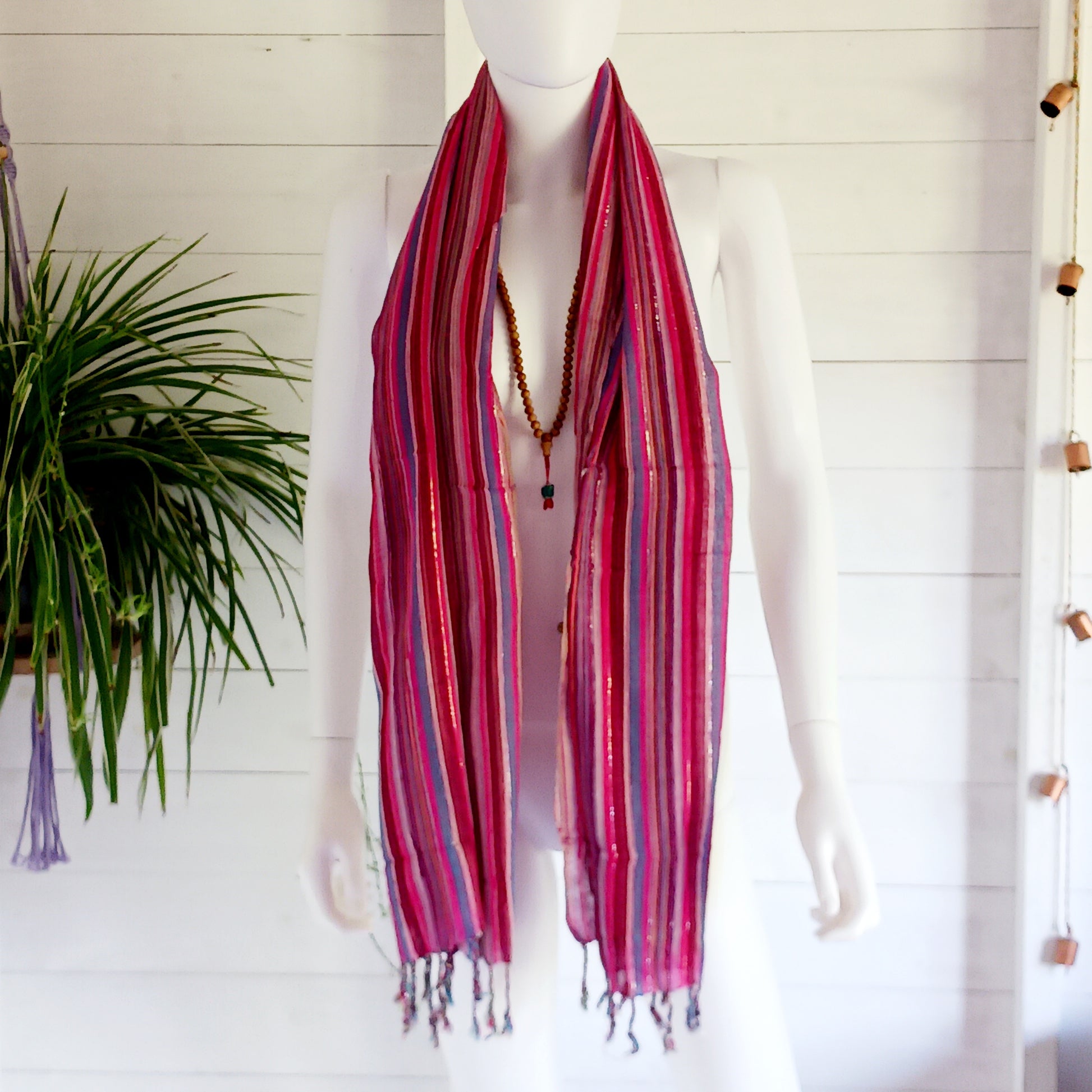 Immerse yourself in the alluring world of bohemian fashion with this delicate Indian Boho Scarf. Crafted with care, each scarf captures the essence of India's free-spirited charm, adding a touch of Boho elegance to your outfit. Whether draped effortlessly over your shoulders, wrapped as a headscarf, or styled with creative knots, this versatile accessory enhances your everyday fashion. Lightweight, breathable, and full of personality, it’s the perfect way to express your unique style.