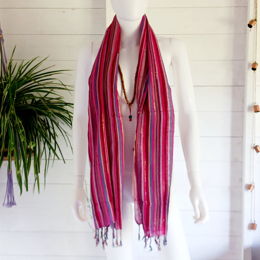 Immerse yourself in the alluring world of bohemian fashion with this delicate Indian Boho Scarf. Crafted with care, each scarf captures the essence of India's free-spirited charm, adding a touch of Boho elegance to your outfit. Whether draped effortlessly over your shoulders, wrapped as a headscarf, or styled with creative knots, this versatile accessory enhances your everyday fashion. Lightweight, breathable, and full of personality, it’s the perfect way to express your unique style.