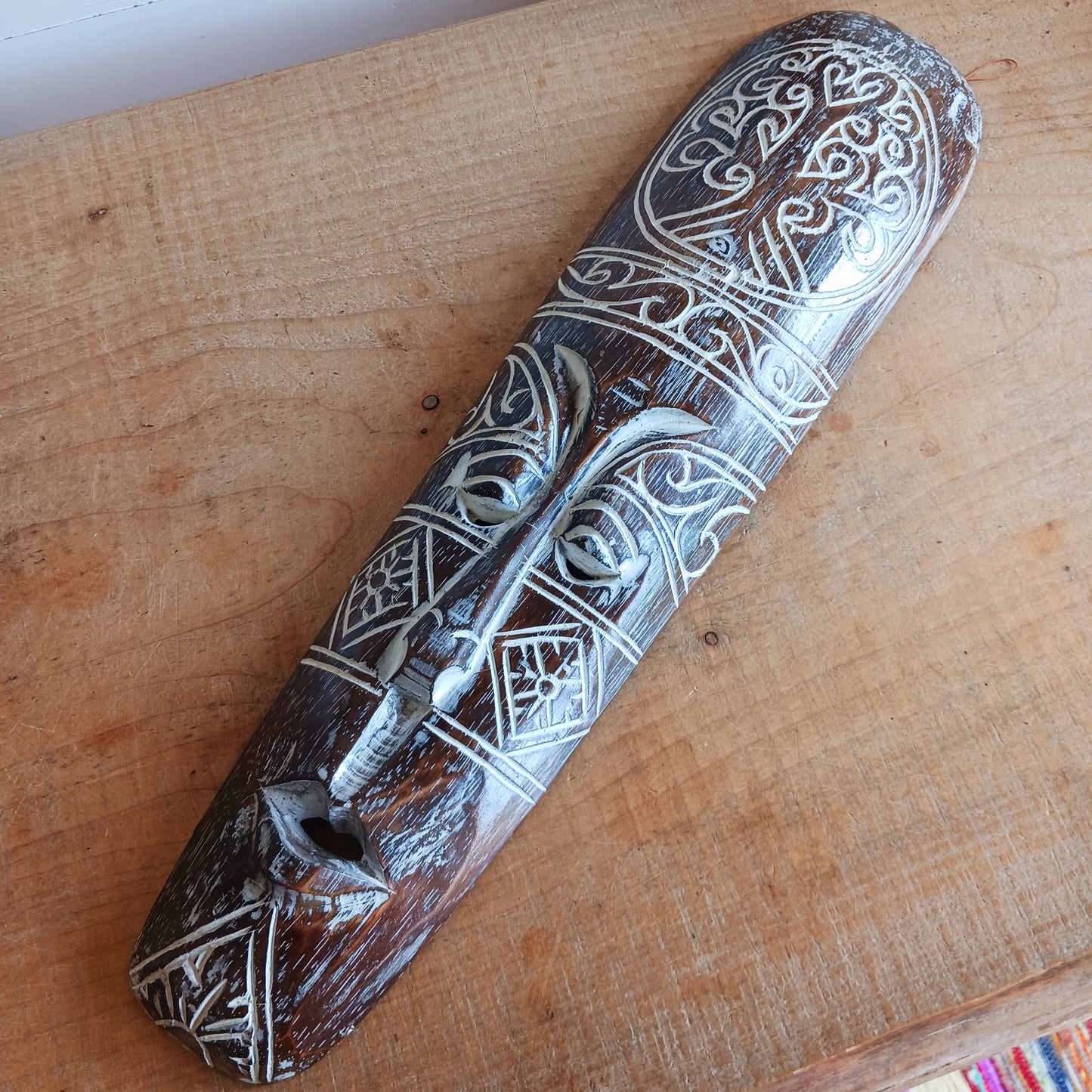 Bring the spirit of Celtic heritage into your home with this beautifully hand-carved Celtic wooden mask, featuring intricate knotwork and a Tree of Life pattern that symbolize eternity, unity, and tradition. Designed for lovers of cultural art and meaningful decor, this striking wall piece adds depth, character, and history to any space.