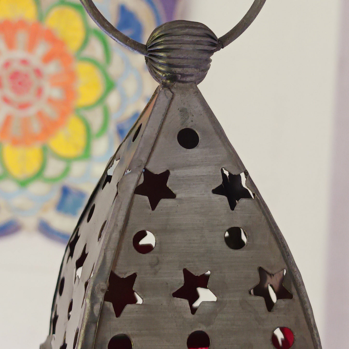 Bring warmth, colour and spiritual harmony to your home with this beautiful Yin Yang Glass Lantern. Designed with vibrant coloured glass panels and a decorative metal cut-out canopy, this lantern creates a calming glow that enhances meditation spaces, yoga rooms and home décor.