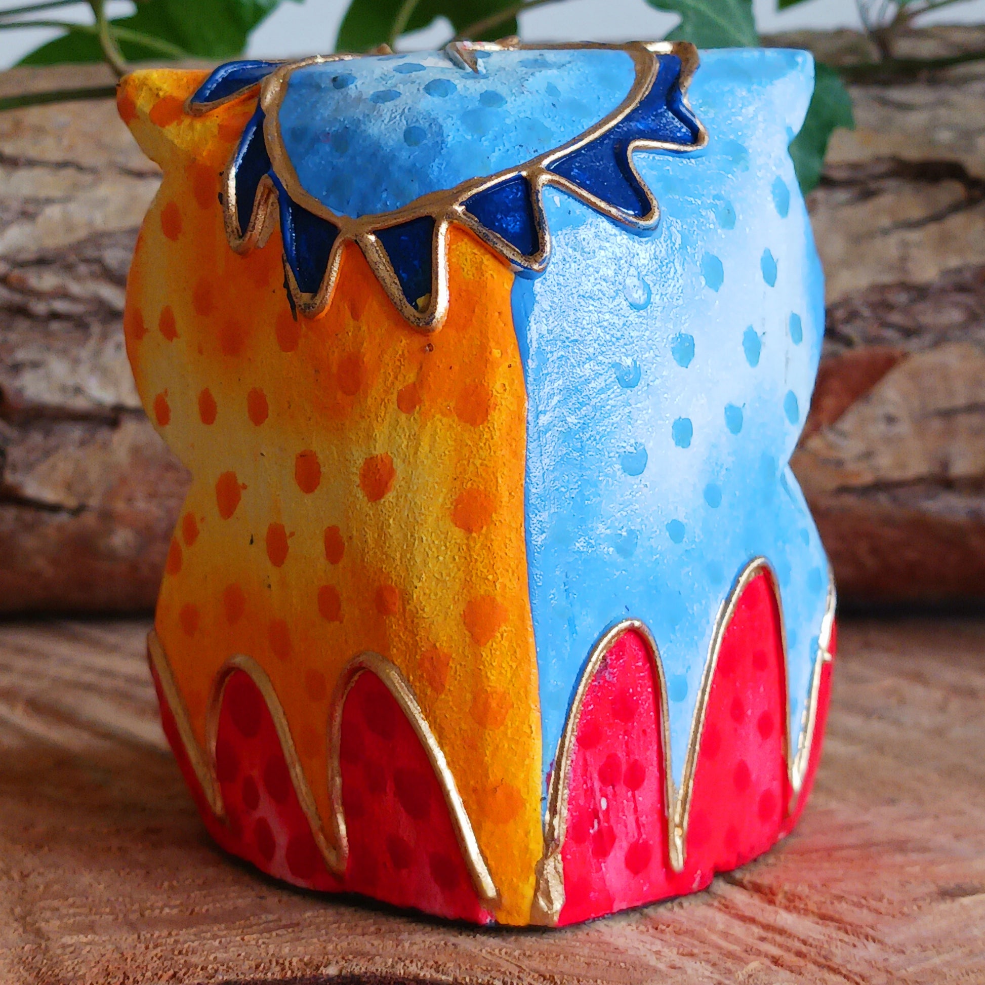 Add a pop of colour to your home décor with these beautifully hand painted Psychedelic Owls. These vibrant and quirky owl figurines instantly brighten any room with their playful charm.