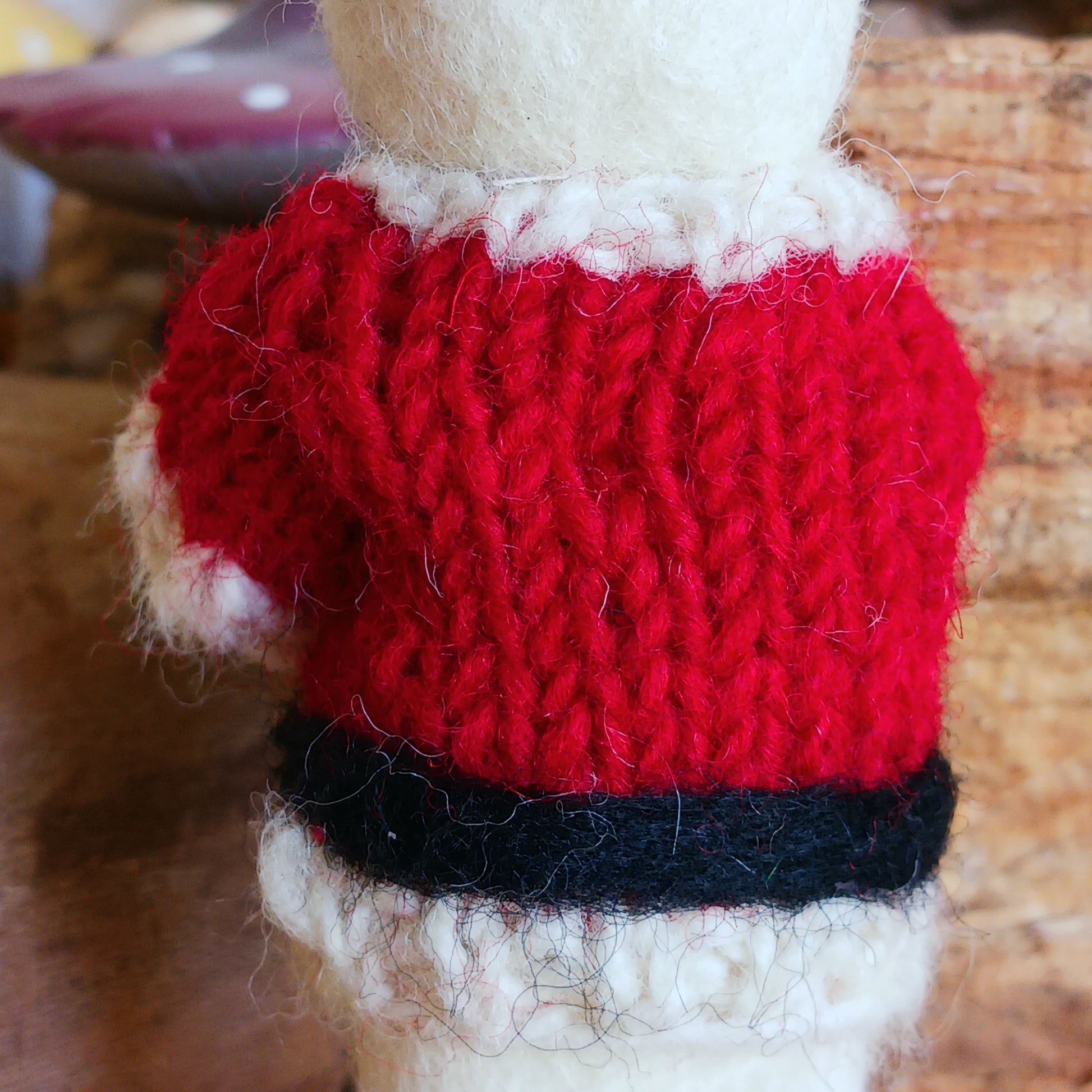 Meet our endearing little Christmas mice, dressed in vibrant Santa knitwear, donning a classic Santa outfit ready to spread festive cheer. Each ornament is lovingly handcrafted, capturing the magic and childlike wonder of the holiday season.