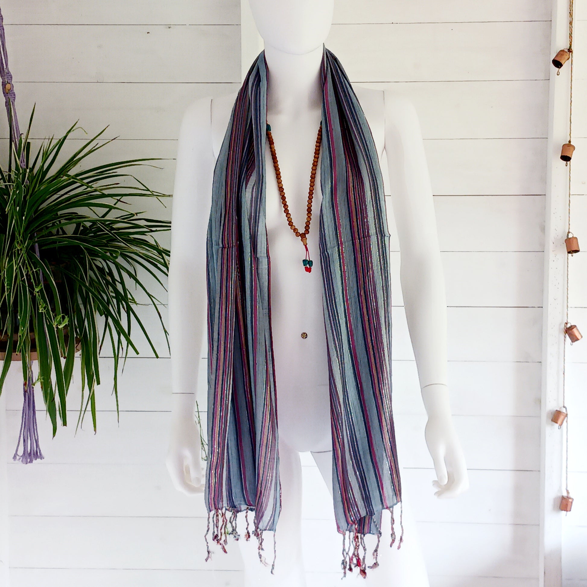 Immerse yourself in the alluring world of bohemian fashion with this delicate Indian Boho Scarf. Crafted with care, each scarf captures the essence of India's free-spirited charm, adding a touch of Boho elegance to your outfit. Whether draped effortlessly over your shoulders, wrapped as a headscarf, or styled with creative knots, this versatile accessory enhances your everyday fashion. Lightweight, breathable, and full of personality, it’s the perfect way to express your unique style.