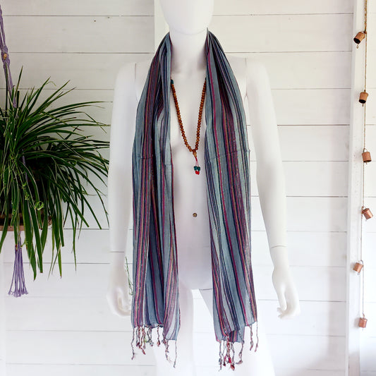 Immerse yourself in the alluring world of bohemian fashion with this delicate Indian Boho Scarf. Crafted with care, each scarf captures the essence of India's free-spirited charm, adding a touch of Boho elegance to your outfit. Whether draped effortlessly over your shoulders, wrapped as a headscarf, or styled with creative knots, this versatile accessory enhances your everyday fashion. Lightweight, breathable, and full of personality, it’s the perfect way to express your unique style.