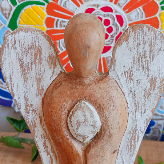  Hati-Hati Angels make beautiful, cultural and caring gifts. Every angel has been carefully carved by hand, sun dried, finished, polished and painted by artisans in rural areas, Hat-hati is a common Indonesian word meaning take care. 