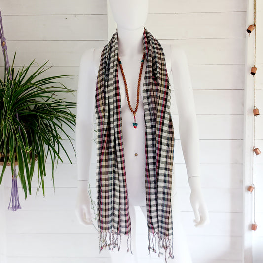 Immerse yourself in the alluring world of bohemian fashion with this delicate Indian Boho Scarf. Crafted with care, each scarf captures the essence of India's free-spirited charm, adding a touch of Boho elegance to your outfit. Whether draped effortlessly over your shoulders, wrapped as a headscarf, or styled with creative knots, this versatile accessory enhances your everyday fashion. Lightweight, breathable, and full of personality, it’s the perfect way to express your unique style.