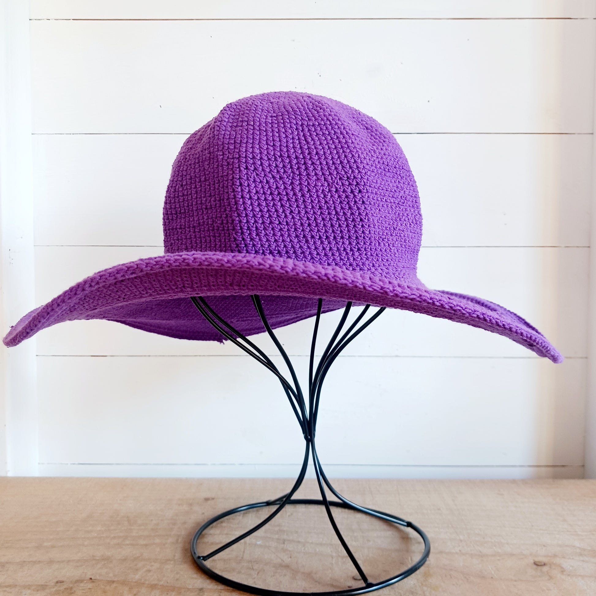 This lovely crochet cotton summer sun hat is perfect for summertime with it's vibrant purple colour.  Each hat has a malleable wire woven into the rim to help keep the shape.  Ideal for holidays and festivals.
