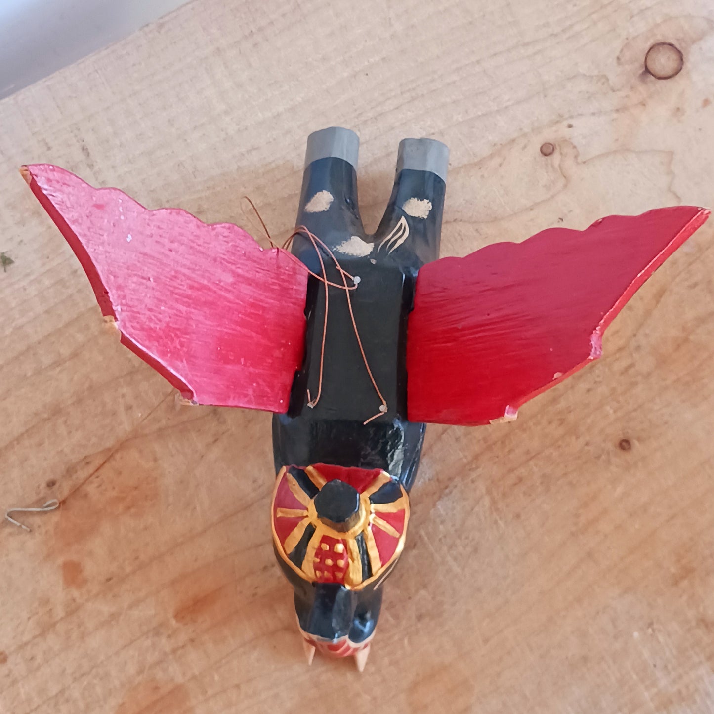 Bring a touch of wonder to your space with this enchanting Flying Elephant Mobile. Each piece is hand-carved from lightweight wood and finished with unique hand-painted patterns, giving every elephant its own personality. Delicately balanced wings hover gracefully with the slightest breeze, creating a calming sense of motion and magic.