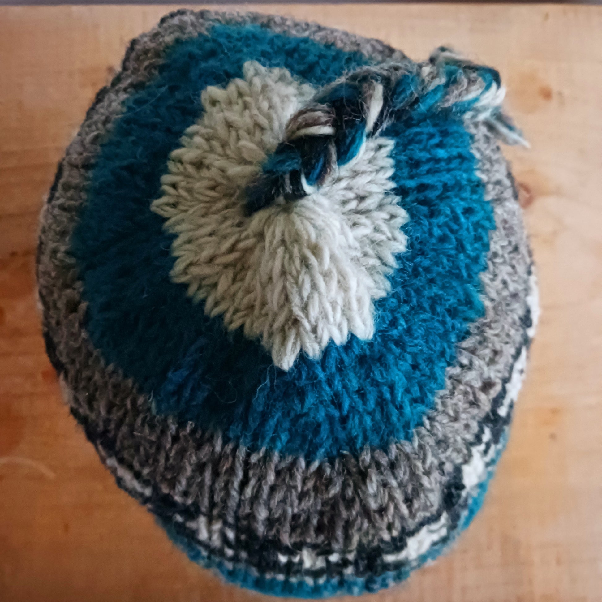 Stay cozy and stylish with our handmade chunky wool earflap hats, crafted in Nepal by skilled women artisans in Kathmandu. Each hat is 100% pure wool and features a soft polar fleece lining for extra warmth and comfort. Perfect for cold winter days, outdoor adventures, or adding a touch of handmade charm to your look.