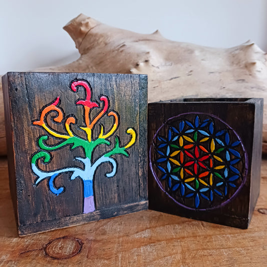 Add a burst of colour and joy to your space with this Hand Painted Tree and Flower of Life Wooden Pots Set, handmade in Indonesia and Fairtrade certified. Each pot is carefully painted by skilled artisans, making every set unique and full of character.