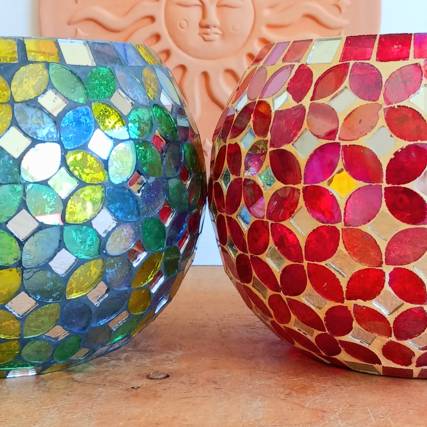 Add a warm, colourful glow to your home with this large and beautiful handmade Meena mosaic glass tealight holder, crafted by a World Fair Trade Organisation (WFTO) approved supplier in India.