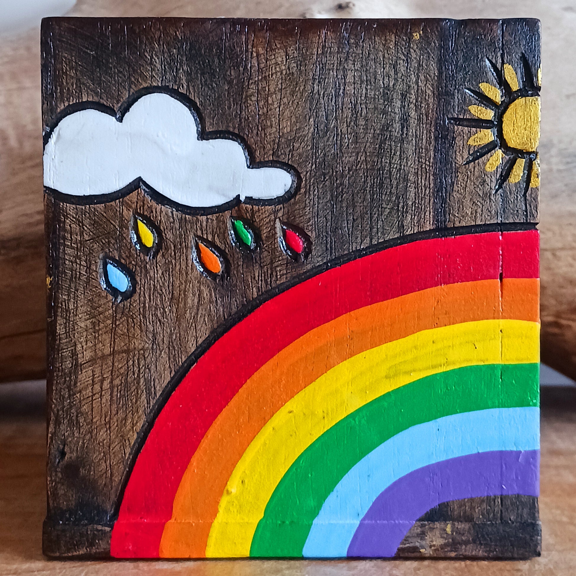 Add a burst of colour and joy to your space with this Hand Painted Rainbow Wooden Pots Set, handmade in Indonesia and Fairtrade certified. Each pot is carefully painted by skilled artisans, making every set unique and full of character.