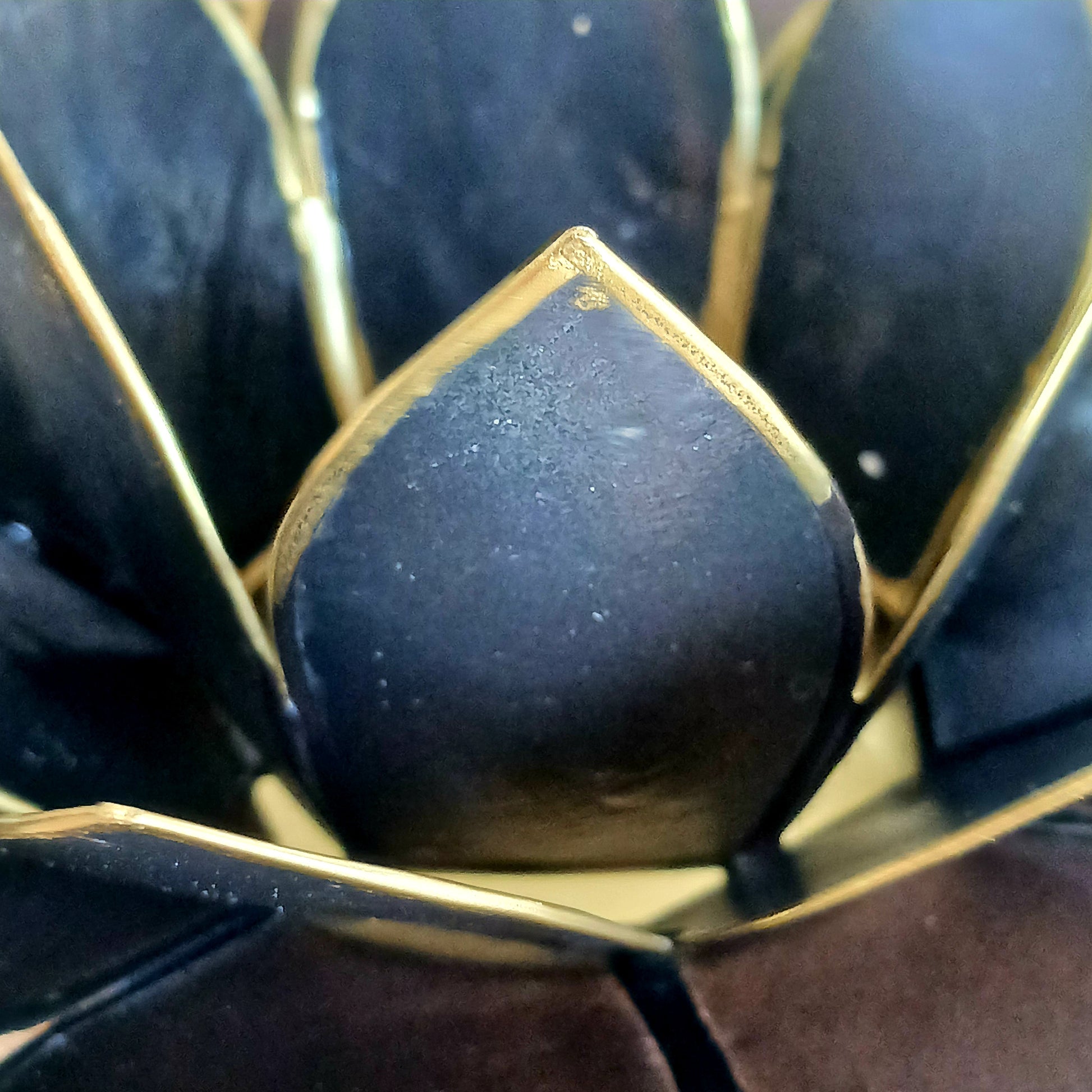The Lotus Flower is a symbol of achieving enlightenment, peacefulness and spirituality. This beautiful candle holder can be fitted with tealight candles or slightly larger candles. The diameter of the middle is roughly 5.5cm, so it will fit any candle with the same diameter.