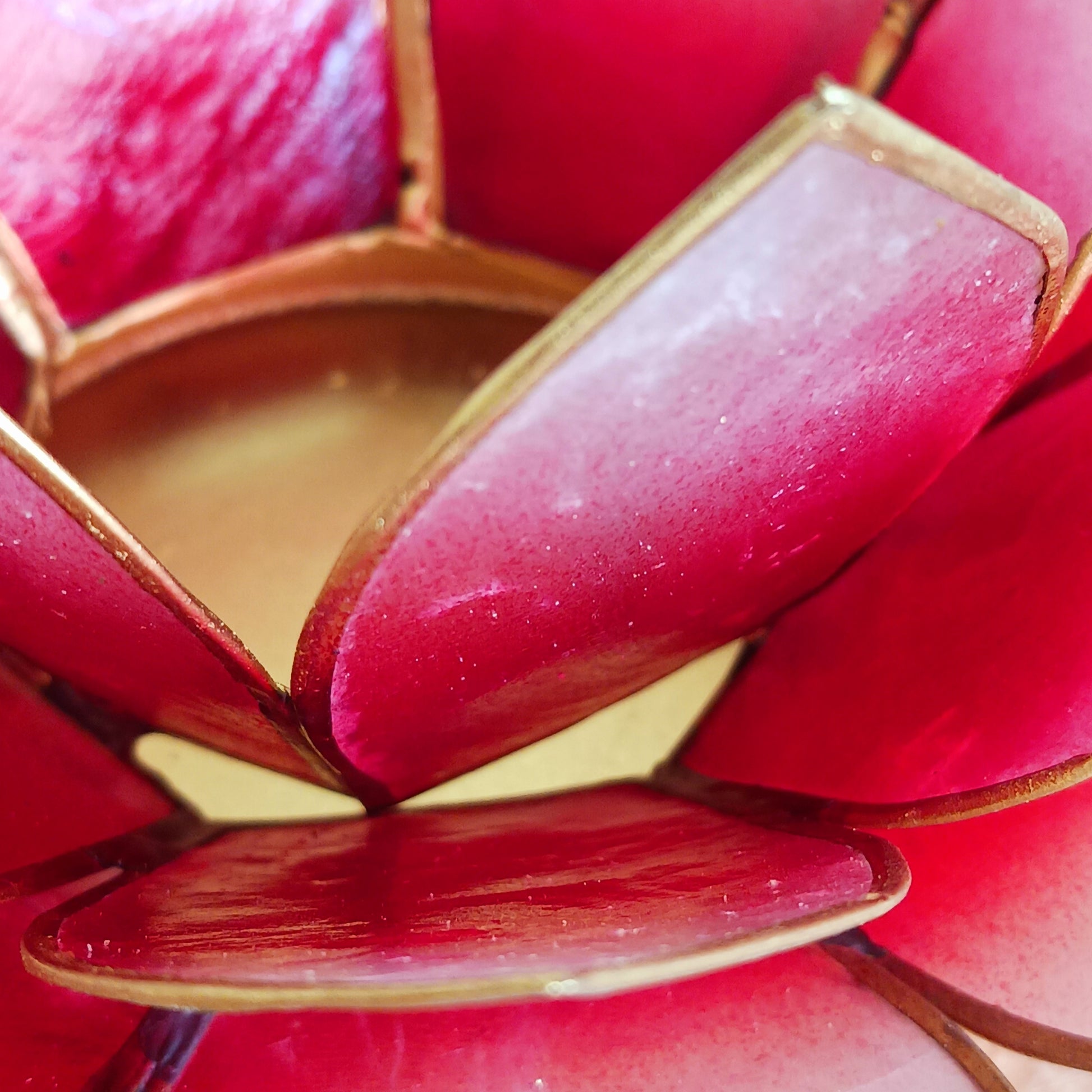 The Lotus Flower is a symbol of achieving enlightenment, peacefulness and spirituality. This beautiful candle holder can be fitted with tealight candles or slightly larger candles. The diameter of the middle is roughly 5.5cm, so it will fit any candle with the same diameter.