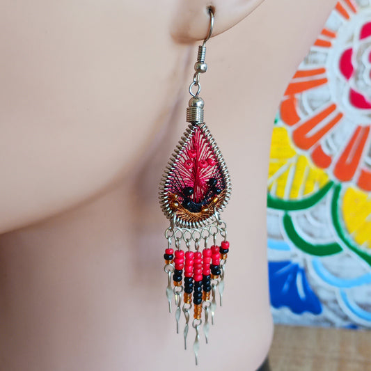 Lovingly handmade in small workshops in Peru, these colourful statement earrings are sourced from ethical, small family businesses. Traditional Peruvian patterns, colourful beads and contemporary details combine to create jewellery that is unique, individual and full of character.
