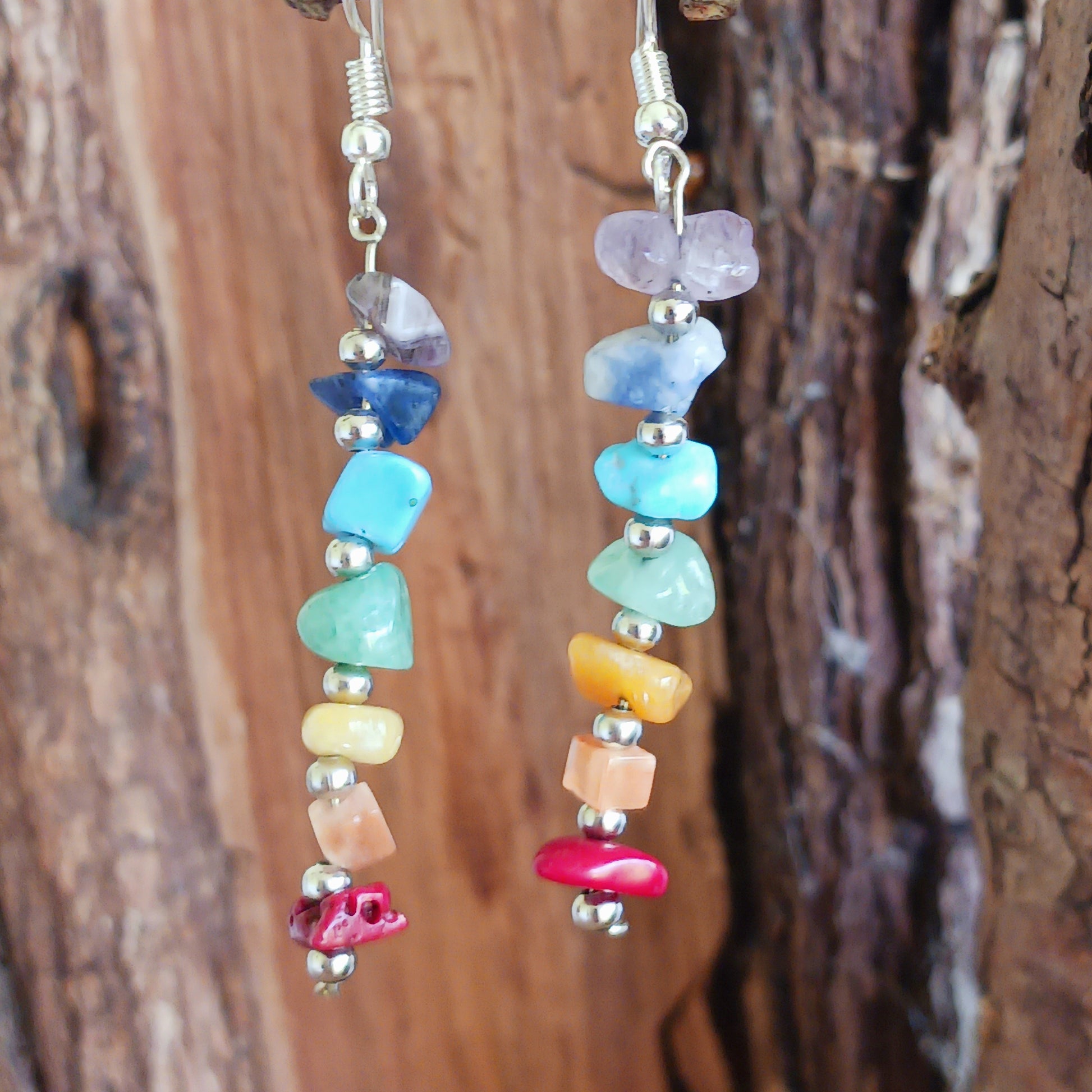 These brightly coloured earrings are made from seven gemstones, each representing one of the seven chakras. 
 Ideal for adding to your boho look and keeping you balanced on a night out.