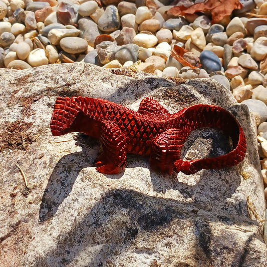 Bring the character of one of the world's most fascinating reptiles into your home with this beautifully hand carved wooden Komodo dragon figurine from Bali.