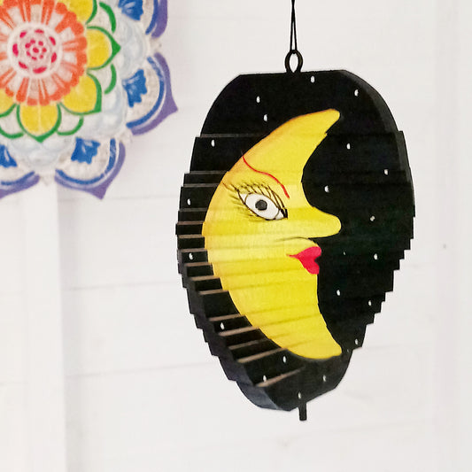 Bring celestial beauty to your space with this stunning Sun & Moon Mobile, handcrafted from sustainable wood for an eco-friendly touch. Designed for both indoor and outdoor use, this unique wind spinner adds movement, colour, and charm to any setting. 