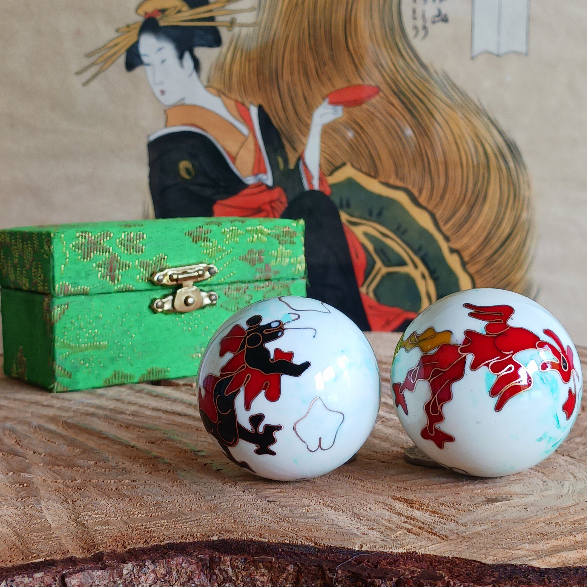 Boost hand flexibility and focus with Chinese Health Balls. Includes 2 chime balls in a silk brocade box. Ideal for relaxation, therapy, and energy balance.