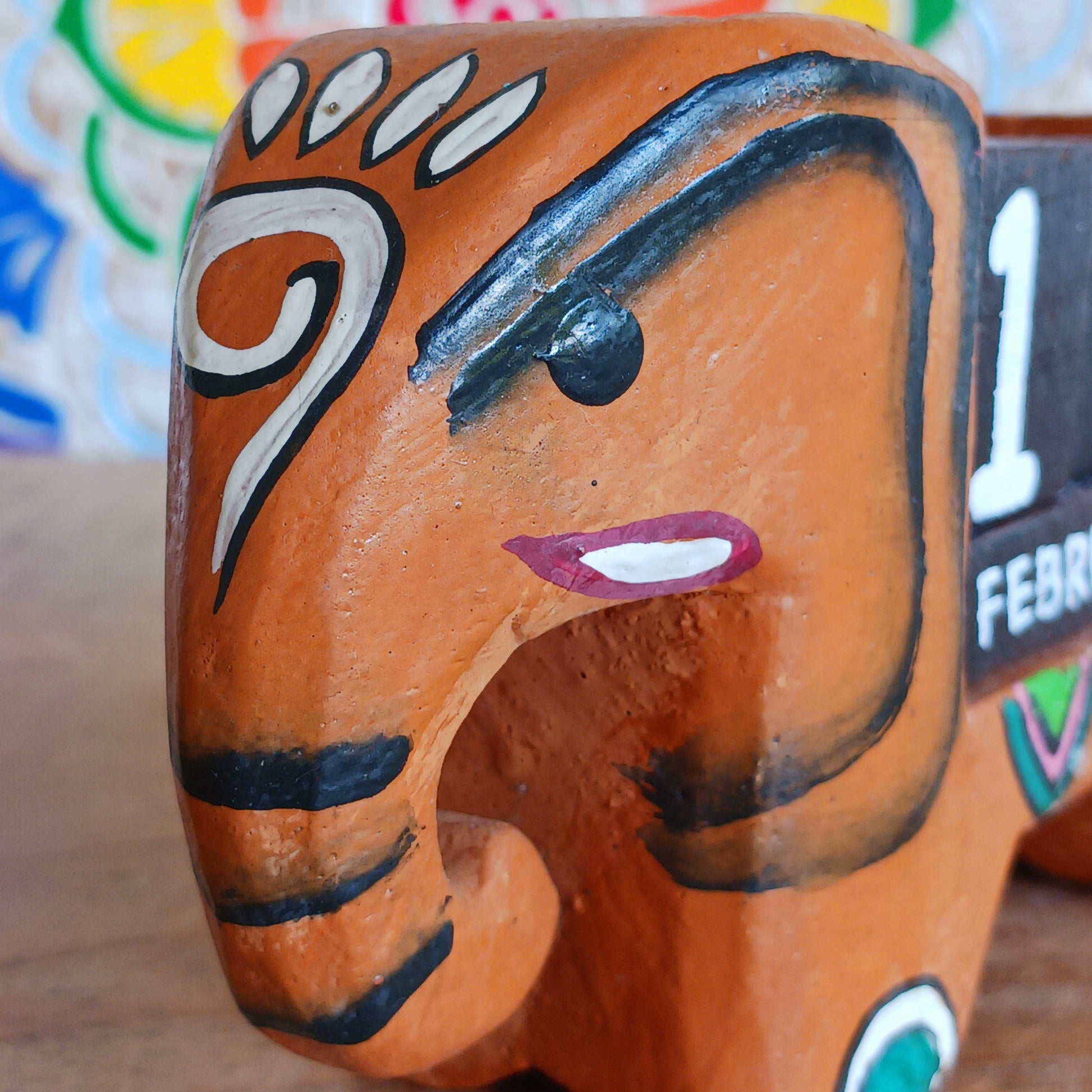 Brighten up your desk with this charming hand-painted wooden elephant calendar! This cheerful desk-buddy is both practical and eco-friendly, making it a perfect addition to your work or study space. Simply rotate the wooden blocks each day to keep track of the date – no need to replace it year after year. A thoughtful, sustainable gift for elephant lovers, students, or anyone who enjoys unique handcrafted décor.